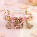 Pink Crystal Bow & Butterfly Charm Bracelet
